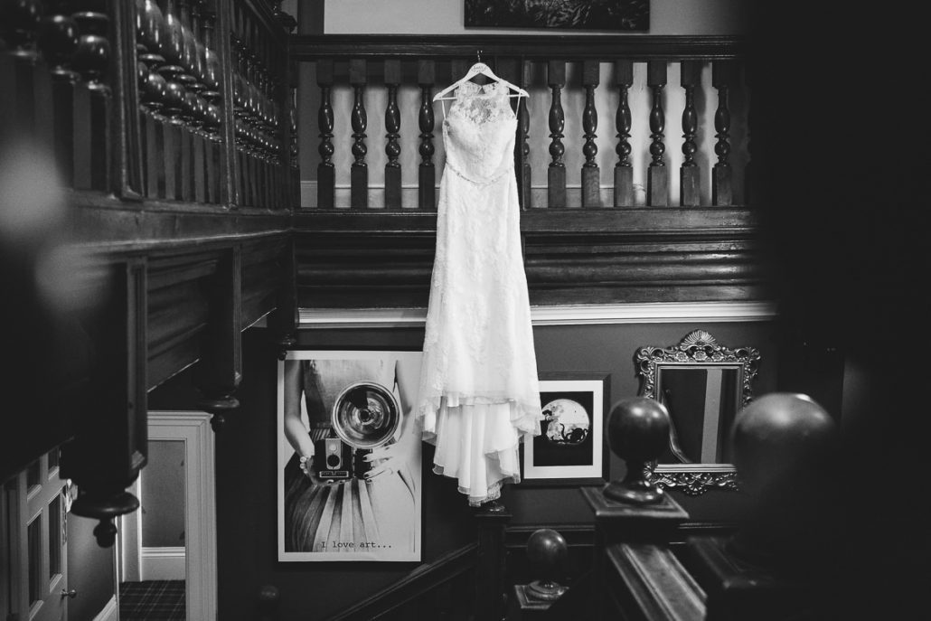 wedding dress hung in Barton Hall